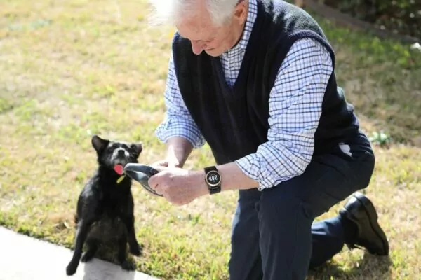 Man with dog wearing the kanega watch